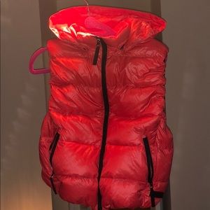 Burnt Red puffer vest by Calvin Klein